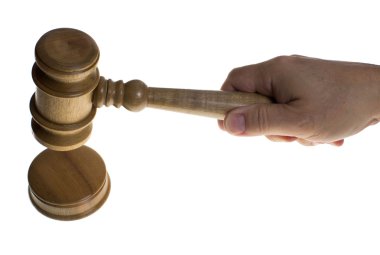 Hand gripping a gavel hitting a strike plate clipart