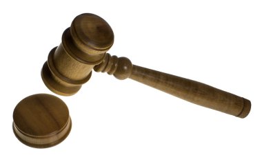 Wooden gavel about to hit the strike plate clipart