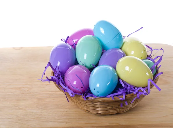 Wicker basket of Easter eggs — Stock Photo, Image