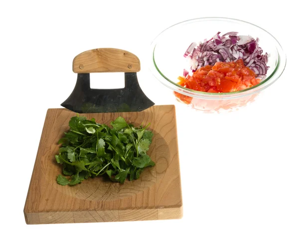 Chopping board and knife with ingredients — Stock Photo, Image