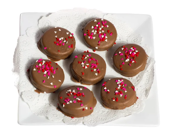 Plate of seven chocolate cookies wit hhearts — Stock Photo, Image