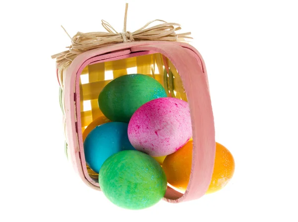 Square Easter basket with colorful dyed eggs — Stock Photo, Image