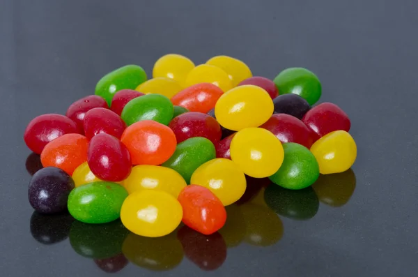 Jelly Beans on black — Stock Photo, Image
