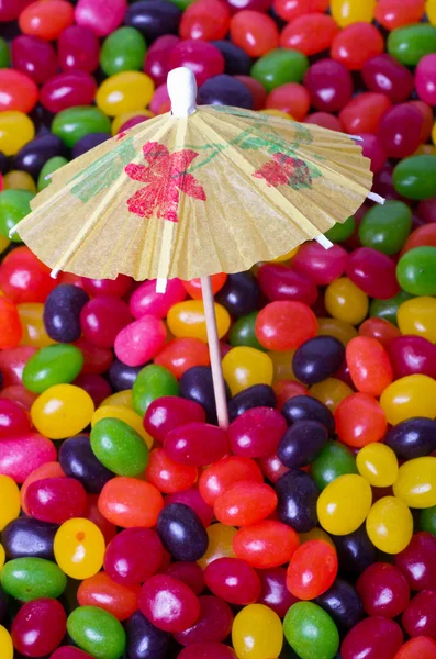 Jelly Bean beach portrait with umbrella — Stock Photo, Image