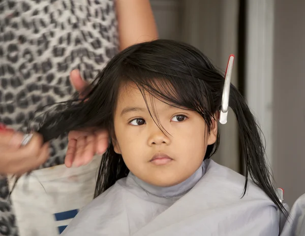 stock image Young girl getting a haircut