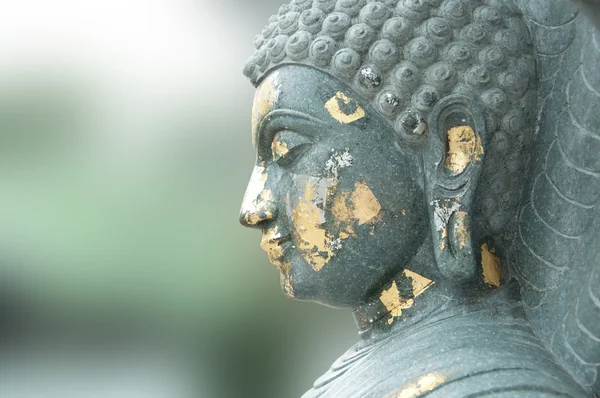 Buda heykelinin yüz — Stok fotoğraf