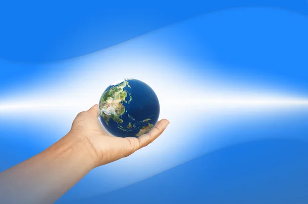 The earth in blue background — Stock Photo, Image