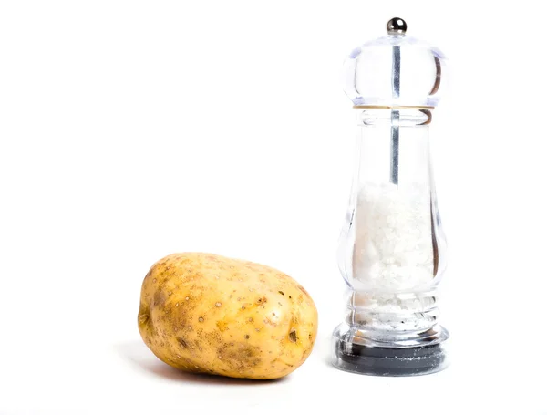New potatoes and salt shaker — Stock Photo, Image