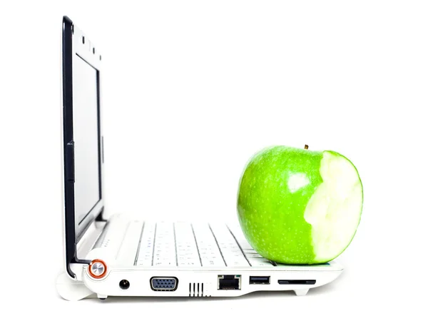 Яблоко и ноутбук Лицензионные Стоковые Изображения