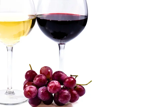 Pair of wine glasses and grapes — Stock Photo, Image