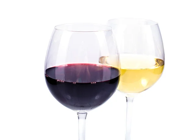 Пара бокалов вина с красным и белым вином Стоковое Фото
