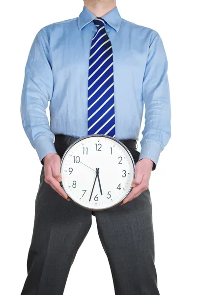 Biznesmen trzymający zegar — Zdjęcie stockowe