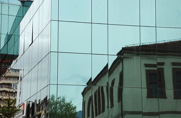 Modern glass building in Macedonia.Reflection in glass building in Bitola, Macedonia