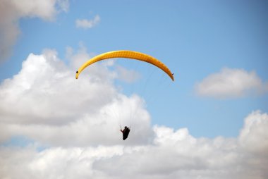 Enjoyment of heights. Paragliding in Macedonia. clipart