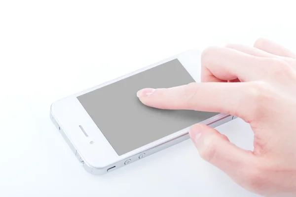Eller bir manikür ile beyaz iphone 4 beyaz bir tutar — Stok fotoğraf