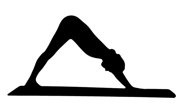Silhouette di una giovane donna che pratica yoga — Foto Stock