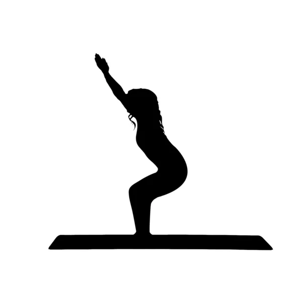Silhouette of a young women practicing yoga — Stock Photo, Image