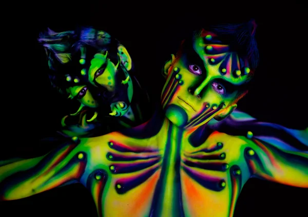 Dwóch mężczyzn z świetlówki ultrafioletowe — Zdjęcie stockowe