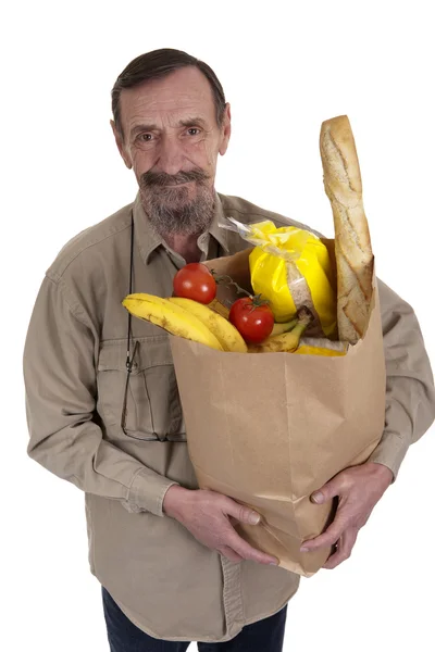 stock image Elderly man with a bag full of groceries