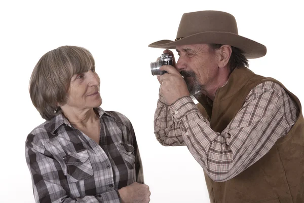 Elderly couple taking photos of eachother — Stock Photo, Image