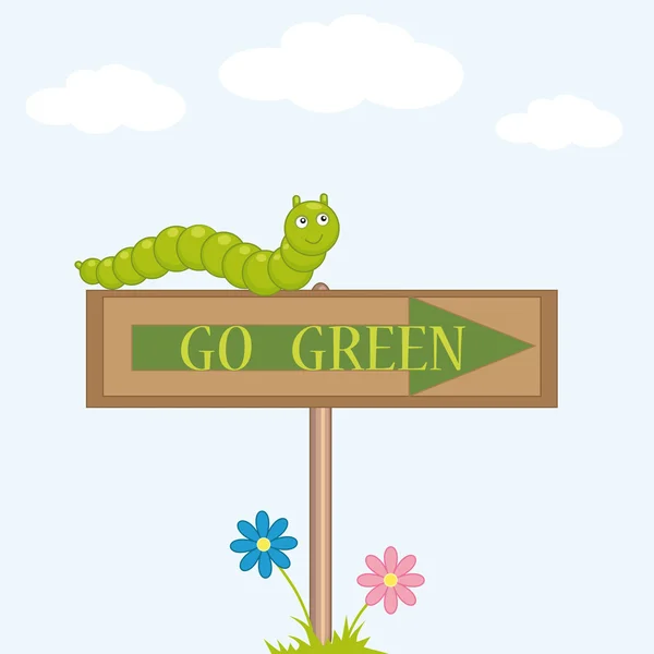 Green caterpillar sits on the sign "go green" — Stock Vector