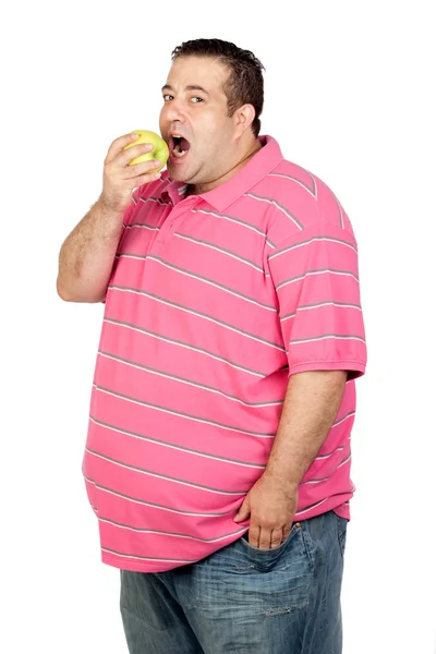 Fat man eating a apple — Stock Photo, Image