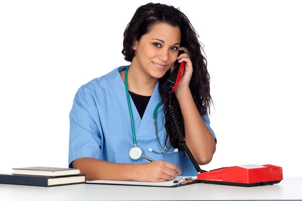 Молодой студент-медик с телефоном — стоковое фото