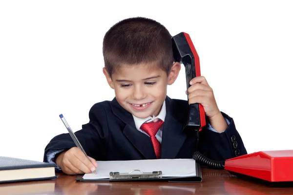Маленький бизнесмен разговаривает по телефону — стоковое фото
