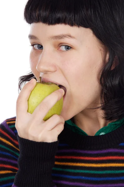 Mädchen isst einen Apfel — Stockfoto