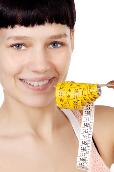 Attractive girl with tape measure — Stock Photo, Image
