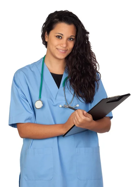 Attractive brunette doctor with a clipboard Royalty Free Stock Images