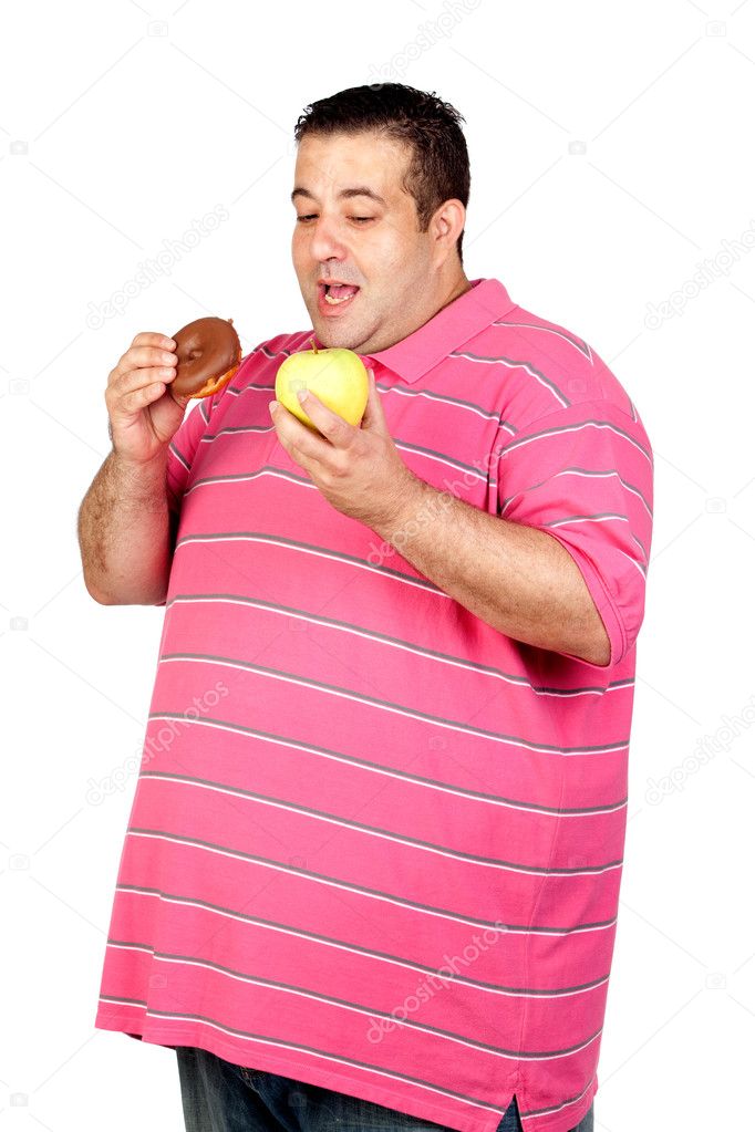 Fat man deciding between a candy and an apple