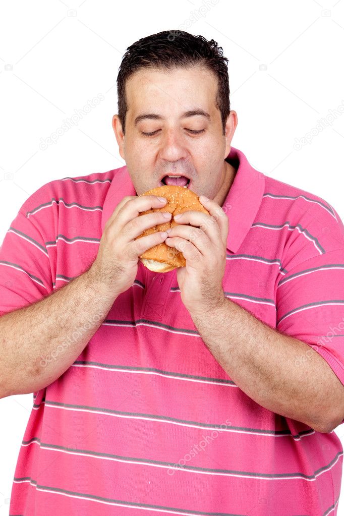 Fat man eating a hamburger