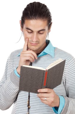 Attractive boy reading a book clipart