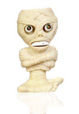Beige plastic toy as a mummy clipart