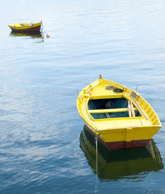 Two yellow rowing boats clipart