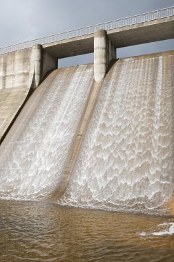 Dam water to generate energy clipart