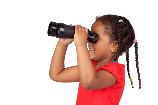 Africano bambina guardando attraverso binocolo — Foto Stock