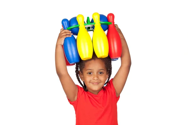 African little girl with with a bowling game on his head — Stock Photo, Image