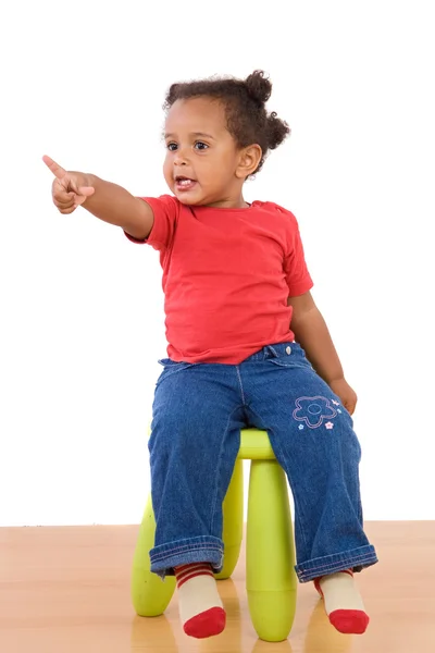 Afrikai baby, ül egy széken — Stock Fotó