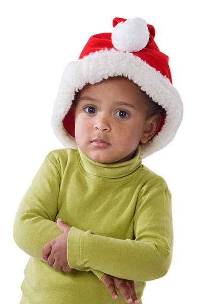 Entzückendes Baby-Mädchen mit rotem Hut von Weihnachten — Stockfoto