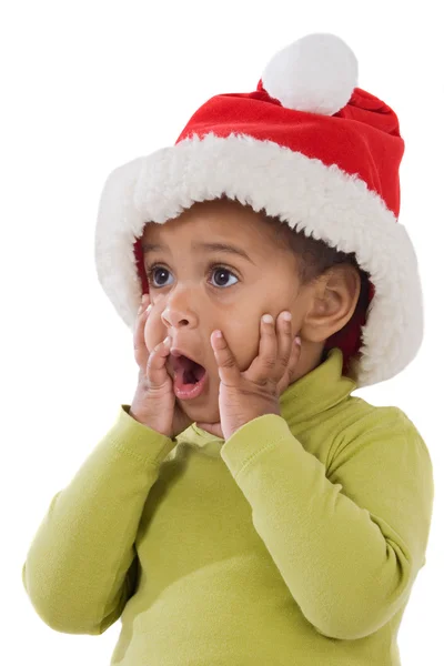 Christmas kırmızı şapkalı kız sürpriz bebek — Stok fotoğraf