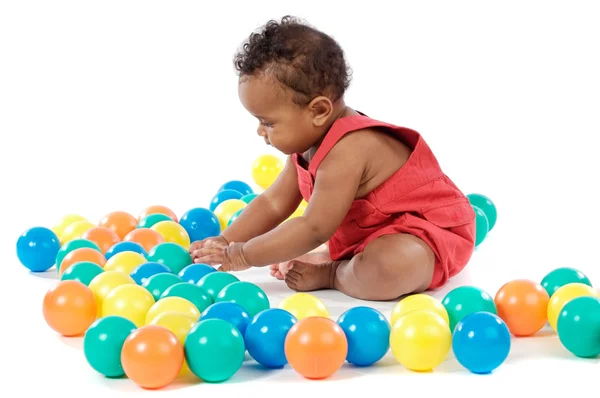 Dítě s míčky — Stock fotografie