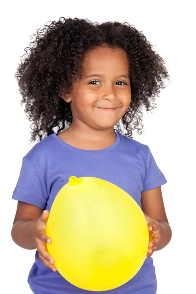Adorable african little girl with yellow balloon — Stock Photo, Image