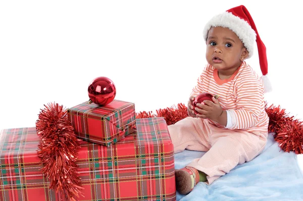 Noel hediyeleri ile kız bebek — Stok fotoğraf