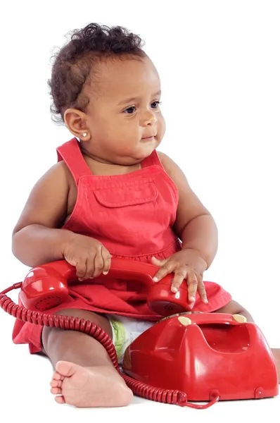 Baby with red phone — Stock Photo, Image