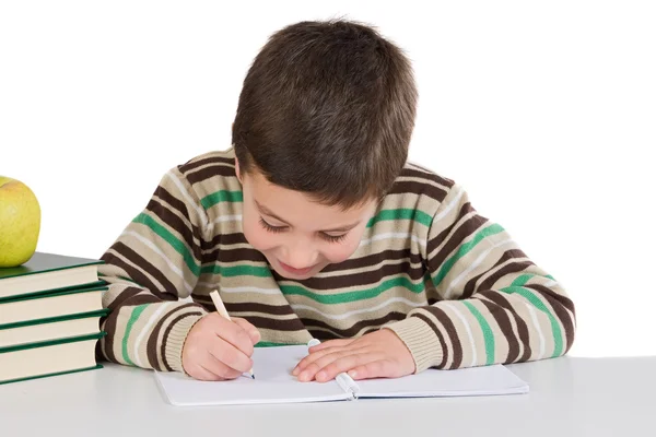 Sevimli çocuk okulda yazma — Stok fotoğraf