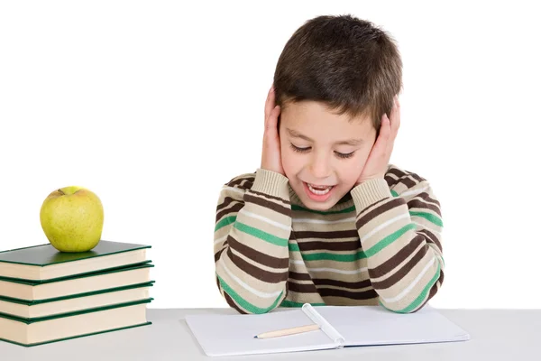 Adorable niño estudiando con libros y manzana —  Fotos de Stock