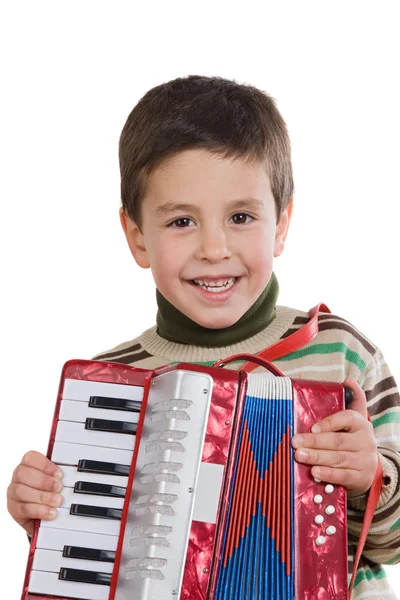 Criança adorável jogando acordeão vermelho — Fotografia de Stock