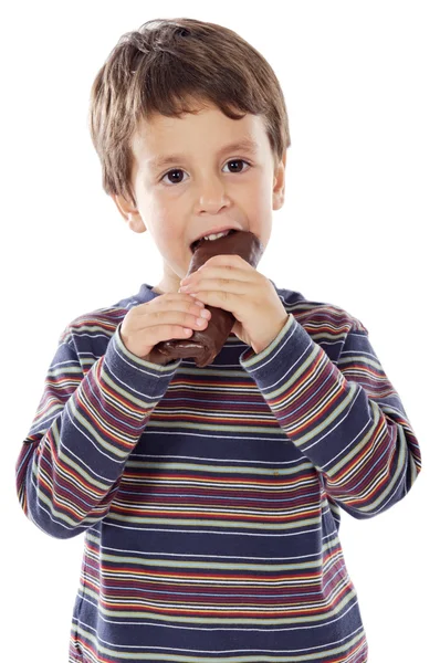 Niño comiendo chocolate —  Fotos de Stock